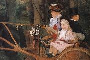 The woman and the child are driving the carriage